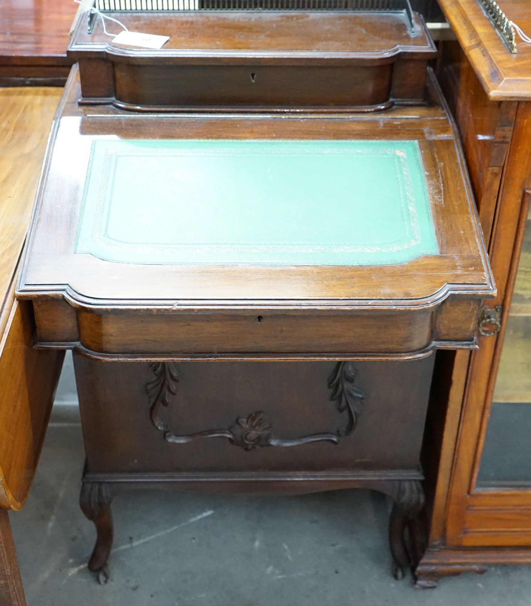 A late Victorian mahogany Davenport, width 56cm, depth 52cm, height 90cm